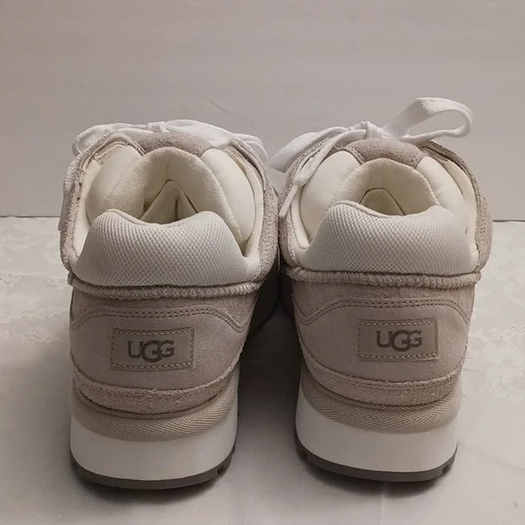 UGG size 11 men's cream and tan casual platfrom sneakers.